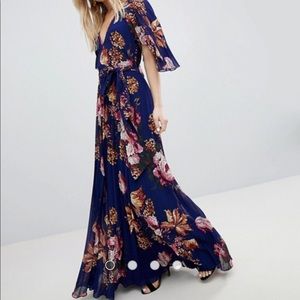 Navy maxi dress with floral pattern.
